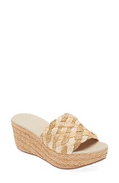 Woven raffia keeps your summery look chic in a classic slide sandal set on a platform wedge. 2 3/4" heel, 1 3/4" platform; 1" slope (size 8.5) Cushioned footbed Textile upper/leather lining/rubber sole Imported Natural Straw Wedge Sandals With Platform, Chic Beige Platform Slippers For Summer, Chic Spring Platform Slippers For Vacation, Natural Open Toe Platform Wedge Sandals, Chic Summer Beach Platform Slippers, Natural Straw Wedge Sandals For Summer, Natural Color Beach Platform Wedge Sandals, Elegant Open Toe Straw Espadrilles, Elegant Straw Espadrilles For Vacation