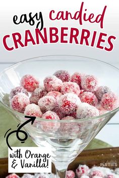 a martini glass filled with cranberries and covered in powdered sugar text overlay says easy candied cranberries