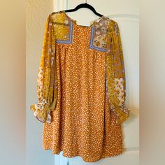 Boho Style, Long Sleeve Shift Dress. Purchased From An Online Boutique But Never Worn. Size Medium But Does Run Large. Mustard Floral Print Mini Dress, Mustard Floral Mini Dress, Yellow Shift Casual Dress, Yellow Shift Dress Casual, Casual Yellow Shift Dress, Yellow Long Sleeve Mini Dress With Floral Print, Casual Mustard Mini Dress With Floral Print, Yellow Printed Fall Dress, Yellow Shift Mini Dress