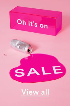 a pink box with a silver object on top of it that says, oh it's on sale view all