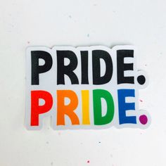 a sticker with the words pride written in multicolored letters on white background