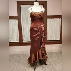 My Gowns Are Not Pre Owned. They Have Not Been Worn, Or Altered. This Gorgeous Chocolate Brown Is So Rich And Pretty. This Gown Has A Little Leopard Print Lining Peeking Out! It's Both Sophisticated And Fun. The Optional Modesty Panel Can Be Worn Beneath The Laces. Size 14 Measures: Bust 39.5"-40.5" Waist 33"-34" Hips 40" The Lace Up Back Allows You To Loosen Or Tighten The Bust And Waist A Little. Make Sure The Hip Measurement Is Accurate. It Has The Designer Hangtag And All Inside Labels Are I Glamorous Fitted Satin Mother Of The Bride Dress, Brown Satin Maxi Dress For Evening, Formal Brown Satin Maxi Dress, Fitted Ruffles Mother Of The Bride Evening Dress, Fitted Satin Ball Gown Evening Dress, Fitted Silk Ball Gown, Glamorous Fitted Ball Gown For Mother Of The Bride, Glamorous Fitted Silk Gown, Fitted Sleeveless Satin Mother Of The Bride Dress