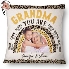 a pillow with an image of two women hugging each other and the words grandma you are on it