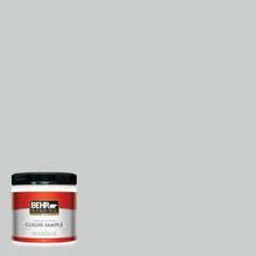 the behr paint color is light gray and it has a black lid on top