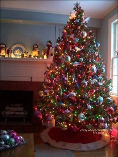 a brightly lit christmas tree in a living room