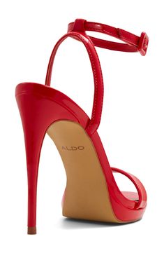 A fierce patent finish highlights the stunning silhouette of this ankle-strap sandal boosted by a subtle platform toe and towering stiletto heel. 4 1/4" heel; 1/2" platform Adjustable ankle strap with buckle closure Cushioned footbed Synthetic upper and lining/rubber sole Made in Brazil Red Platform Heels, Red Stiletto Heels, Very High Heels, Red Stilettos, Strappy Stilettos, Red Sandals, Ankle Heels, Stiletto Sandals, Platform Sandals Heels