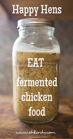 a jar filled with food sitting on top of a wooden table