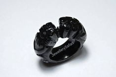 Buyer Will Receive 1 Piece Gorgeous Natural Black Onyx Hand Carved Rajasthani Design Single Gemstone Made Ring. you will really love it.you will gift it to your love ones and friends. Product Details Product Name -Natural Black Onyx Gemstone Made Ring Gemstone - Natural Black Onyx Quantity - 1 Piece 100% Natural ----------------------------------------------------------------------------- THIS BEAUTIFUL ITEM IS AVAILABLE ONLY ON ETSY -------------------------------------------------------------- Black Carved Jewelry Gift, Black Carved Round Rings, Carved Black Rings As Gift, Carved Black Rings For Gift, Unique Black Ring For Anniversary, Handmade Black Jewelry For Wedding, Unique Black Anniversary Ring, Black Carved Ring Jewelry, Unique Black Obsidian Jewelry