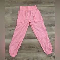 Fabletics Pink Parachute Pants Size S. Brand New, Never Worn! Pink Gym Bottoms With Pockets, Pink Activewear With Pockets For Spring, Spring Pink Activewear With Pockets, Pink Athleisure Joggers With Elastic Waistband, Pink Athleisure Sweatpants With Pockets, Sporty Spring Activewear Long Pants, Sporty Long Pants Activewear For Spring, Pink Activewear With Pockets For Workout, Pink Workout Activewear With Pockets