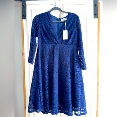 Beautiful, Navy Blue Lace Dress, Knee Length, And Elbow Length Lace Sleeves. You Can Wear It For A Wedding Or A Cocktail Party. It Has Never Been Worn And The Material Is Outstanding. It Has A V-Neck Very Flattering Neckline. It Gives You A Very Nice Silhouette. Blue Long Sleeve Lace Dress, Blue Long Sleeve Lace Midi Dress, Blue Lace Long Sleeve Dress, Hot Pink Mini Dress, Navy Blue Lace Dress, Elegant Evening Dress, Calvin Klein Black Dress, Dress And Jacket Set, Target Dress