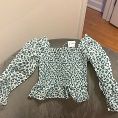 Fun And Trendy! Playful Long Sleeve Tops With Ruffles, Cute Printed Tops For Fall, Playful White Fitted Top, Playful Fitted White Top, Playful Long Sleeve Summer Blouse, Cute Long Sleeve Printed Tops, Long Sleeve Graphic Print Tops For Brunch, Cute Fitted Tops For Brunch, Playful Green Top With Ruffles