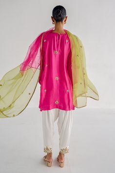 Pink kurta with floral zardosi, sequin embroidery. Paired with salwar and two tone organza dupatta.
Components: 3
Pattern: Embroidered
Type Of Work: Zardosi
Neckline: Round
Sleeve Type: Flared
Fabric: Silk, Cotton satin, Organza, Lining: Shantoon
Color: Pink
Other Details: 
Border detailing
Side slits
Embroidered two tone sheer dupatta
Occasion: Puja - Aza Fashions Eid Tissue Silk Unstitched Suit For Celebration, Party Cotton Silk Salwar Kameez With Dabka Work, Party Salwar Kameez With Dabka Work In Cotton Silk, Party Kurta With Sheer Dupatta In Tissue Silk, Cotton Silk Unstitched Suit With Sheer Dupatta For Party, Festive Tissue Silk Unstitched Suit For Celebration, Festive Raw Silk Kurta With Sheer Dupatta, Festive Silk Kurta With Sheer Dupatta, Party Dupatta With Resham Embroidery In Cotton Silk