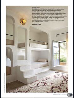 the interior of a bedroom with white walls and carpeted flooring is featured in an article