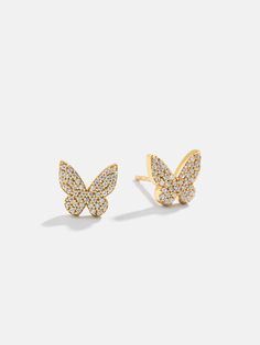 Accessories with styles that make your heart flutter. The 18K Gold Butterfly Earrings are adorable studs that bring the shine with cubic zirconia stones, and the class with its 18k gold plated sterling silver material. Delicate and dainty, these earrings are sure to soar in your everyday jewelry rotation. Gold Butterfly Earrings Studs, Gold Cubic Zirconia Butterfly Earrings, Yellow Gold Butterfly Earrings With Cubic Zirconia, Yellow Gold Cubic Zirconia Butterfly Earrings, Gold Butterfly Earrings, Crystal Bead Jewelry, Butterfly Earrings Gold, Butterfly Stud Earrings, Heart Flutter