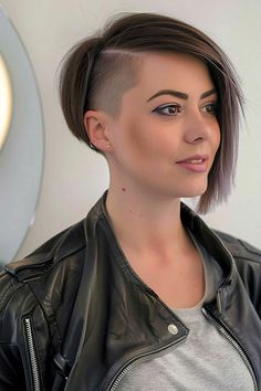 The Trending Bixie Haircuts of 2024 Sidecut Bob, Undercut For Women, Asymmetric Hair, Bob With Shaved Side, Deep Brunette, Edgy Undercut, Edgy Bob Haircuts, Undercut Bob Haircut, Side Shaved