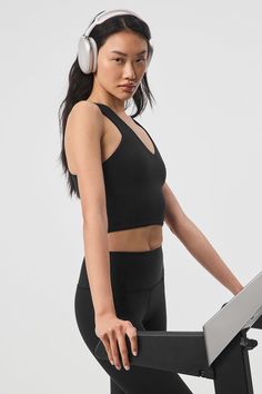 When you want the coverage of a tank and the support of a bra, reach for this. The Real Bra Tank has wide straps, a flattering V-neck, a built-in shelf bra and a racerback. Made from our signature Airbrush fabric that’s super soft with medium compression, you’ll go from Pilates to perusing the farmers market without missing a beat. Bra Tank, Woman Back, Back Women, Shelf Bra, Alo Yoga, Wide Straps, Farmers Market, Bra Tops, Pilates