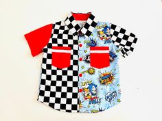 Our Sonic Racer! Sonic the Hedgehog Button Down Collared Shirt is a special made to order item.   Made of 100% cotton.  Perfect for birthday parties, special occasions or everydaywear for kids.   Follow us on Instagram: www.instagram.com/fragileeccentricsclothing/ Visit our website: www.fragileeccentrics.com Themed Cotton Shirt With Cartoon Print, Fun Cotton Shirt For Playtime, Fun Red Shirt With Cartoon Print, Sonic The Hedgehog And Tails, Cotton Gifts, Button Up Dress, The Hedgehog, Collared Shirt, Tee Dress