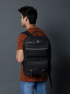 Indulge in timeless elegance with our NoirTrek Leather Backpack 2.0. Crafted in sophisticated black leather, this backpack effortlessly complements any outfit while providing ample storage. Its minimalist yet edgy design caters to the tastes of the youth, featuring clean lines and a contemporary silhouette. The backpack boasts a streamlined profile that remains on-trend while maintaining a sense of timelessness. The carefully chosen details, such as the silver zipper and snap closures gives it, Luxury Leather Commuting Backpack, Black Backpack With Leather Backing For Commuting, Classic Black Bag For Commuting, Classic Standard Backpack For Commuting, Classic Black Leather Backpack, Black Business Backpack With Leather Lining, Classic Commuter Backpack, Soft Leather Backpack For Commuting, Classic Black Leather Backpack For Travel