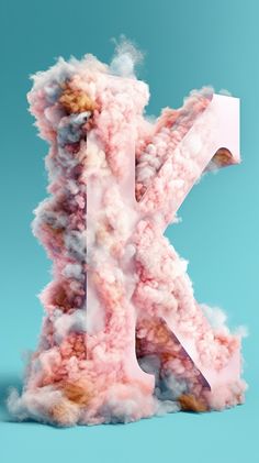 the letter k is made up of clouds and powdered with pink, white and blue colors