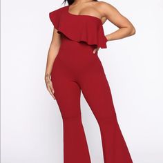 Brand New, Never Worn All Red One Shoulder Ruffled Jumpsuit. Full Stretch, Flare Bottom. Red Strapless Jumpsuit For Night Out In Spring, Red Strapless Jumpsuit For Spring Night Out, Red High Waist Jumpsuits And Rompers For Party, High Waist Red Jumpsuits And Rompers For Night Out, Red High-waist Jumpsuits And Rompers For Party, Chic Red High Waist Jumpsuits And Rompers, Chic Red Bodysuit For Date Night, Chic Red High-waisted Jumpsuits And Rompers, Red Stretch Jumpsuit For Date Night