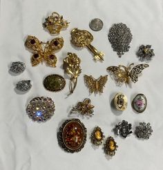 A group of rhinestone brooches and clip on earrings four pairs of clip on earrings And 12 brooches all with glass rhinestones everything intact nothing missing all stones present in great condition #181 Rhinestone Brooches, Clip On Earrings, Jewelry Necklace Pendant, Beauty Book, Jewelry Necklaces, Pendant Necklace, Accessory Gift, Electronic Accessories, Stone