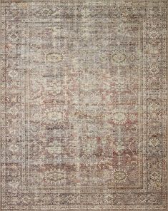 an antique rug with faded colors