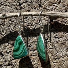 Malachite Sterling Silver Dangle Earrings Malachite is a natural stone said to welcome prosperity and abundance. It is also used as a protection stone for pregnant women and children. Physically it is used to help with chronic inflammatory illnesses like asthma and arthritis. These earrings are made from sterling silver and come in various stone shapes. The store will select your style based on availability. Green Malachite Jewelry For Meditation, Elegant Silver Malachite Jewelry, Unique Silver Malachite Jewelry, Spiritual Green Malachite Jewelry, Silver Malachite Pendant Necklace, Protection Stones, Sterling Silver Dangle Earrings, Pregnant Women, Natural Stones