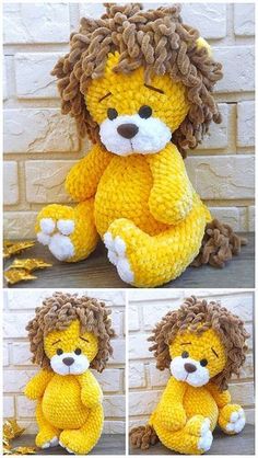 the stuffed lion is yellow and has brown fur on it's head, sitting in front of a brick wall