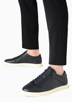 Find GIORGIO ARMANI Nappa-leather Sneakers on Editorialist. These supple nappa-leather sneakers have a laid-back allure. This style, available in versatile shades, is embellished with a monochromatic stitching motif that customises the upper. An accessory that lends itself to numerous daytime looks with a relaxed yet refined spirit.