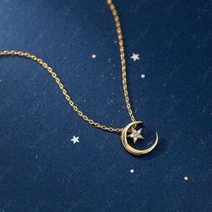 Crafted with superior quality materials, this necklace maintains its shine for an extended period of time. Adorned with a charming crescent moon and a sparkling cubic zirconia star in the center, all delicately placed on a slender cable chain. With its versatile style, this necklace makes for a thoughtful present on special occasions such as birthdays, Mother's Day, Thanksgiving, Christmas, and more. Chain length: 40 cm + 4 cm Shipping Policy: Order will be shipped within 1-3 business days. Firs Birthday Mother, Moon Pendant Necklace, Sterling Silver Necklace Pendants, Book Ideas, Moon Pendant, Gold Pendant Necklace, Perfect Gift For Her, Everyday Jewelry, Silver Pendant Necklace