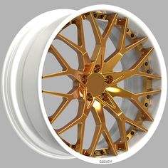 an image of a gold rim on a white wheel