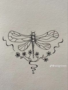 a black and white drawing of a dragonfly