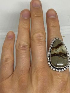 Large brown agate Ornate German Silver Vintage ring, does not tarnish NOT 925 Size 10 can be re sized, my jeweler charges a $10 - $15 fee All rings are shipped free in the US in a nice gift box. Check out our over a THOUSAND great reviews Engraving is $4 per letter and is not always perfect depending on the piece. It can take a few days if the jeweler is busy. This is payable to Paypal Judithsltd@gmail.com Brown Sterling Silver Rings With Natural Stones, Artisan Brown Gemstone Rings, Sterling Silver Rings With Brown Natural Stones, Unique Brown Jewelry For Anniversary, Brown Large Stone Ring Jewelry, Brown Large Stone Ring, Brown Gemstone Ring In Sterling Silver, Collectible Brown Gemstone Rings, Brown Gemstone Sterling Silver Rings