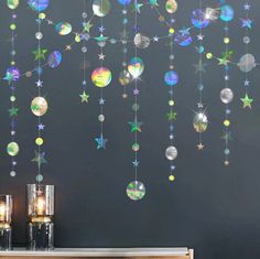 a wall with stars and bubbles hanging from it