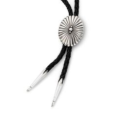 This sterling silver bolo tie by Santa Fe artist David Dear is a prime example of extraordinary New Mexico silver-work. David’s Southwest, art deco inspired sterling silver and gold jewelry designs are shown throughout the United States and collected all over the world. Designed and fashioned in the Land of Enchantment. Adjustable Southwestern Jewelry With Sterling Silver Clasp, Southwestern Silver Jewelry With Adjustable Cord, Artisan Silver Jewelry With Adjustable Length, Silver Western Jewelry With Adjustable Cord, Adjustable Southwestern Jewelry With Polished Finish, Western Style Silver Jewelry With Adjustable Cord, Traditional Adjustable Jewelry For Rodeo, Western Silver Bolo Tie With Adjustable Cord, Elegant Adjustable Concho Bolo Ties