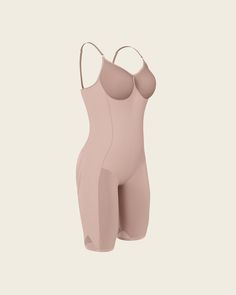 This bodysuit is the ultimate in technology, comfort, and shaping. It's made of our signature SkinFuse® fabric for moderate compression to shape your curves. Targeted compression adds a little extra shaping in the tummy and waist to gently create an hourglass effect. This bodysuit covers from the bust down to the knees and a flex-fit design at the thighs provides extra flexibility for comfortable wear. Lighter fabric in the bust and bottom prevent flattening. The bodysuit's seamless design makes Legging Sport, Support Bras, Active Wear Leggings, Body Shapers, Shop Swimwear, Medium Brown, Sport Running, Second Skin, Fitted Dress