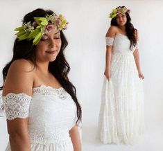 a woman wearing a white dress with flowers in her hair is posing for the camera