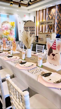 a table set up for a birthday party