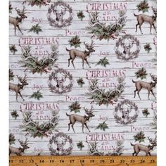 christmas fabric with deer and wreaths on it