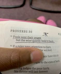 someone is reading the book provers 30