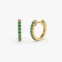 Made to Order Gold Kt: 14K Solid Gold Available Gold Color: Rose Gold, Yellow Gold, White Gold The Inner diameter of Earrings: 10MM The Outer diameter of Earrings: 12MM Round Emerald: 14 pcs 1.5 MM Total CTW: 0.25 Ctw (Total Carat Weight for the Pair) Green 14k Gold Hoop Earrings, Green Huggie Earrings With Matching Set, Green Fine Jewelry Huggie Earrings For Gift, May Birthstone Round Hoop Earrings, May Birthstone Round Hoop Earrings For Pierced Ears, Green Pierced Hoop Earrings For Anniversary, May Birthstone Huggie Earrings Gift, May Birthstone Huggie Earrings, Green Huggie Earrings For Everyday Wear