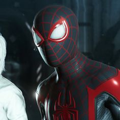 spider - man and white haired woman standing next to each other