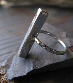 Thick sterling silver modern bar ring. Quality artisan made. Polished finish jewelry. Textured band. Modern Sterling Silver Hand Forged Stackable Rings, Modern Sterling Silver Hammered Rings, Modern Hand-forged Sterling Silver Stackable Rings, Minimalist Hand Forged Silver Stackable Rings, Modern Hand Forged Silver Stackable Rings, Minimalist Sterling Silver Rectangular Stackable Rings, Minimalist Sterling Silver Stackable Rectangular Rings, Minimalist Hand-forged Silver Stackable Rings, Bar Ring