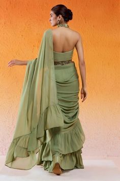 Pista green pre-draped ruffle saree. Paired with a matching embroidered padded blouse and a belt. - Aza Fashions Green Sequin Saree, Ruffle Sarees, Pista Green, Sequin Saree, Ruffle Saree, Padded Blouse, Drape Saree, Green Saree, Set Women