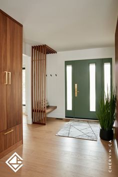 A bright and warm foyer with a green door, a floating wood bench and walnut slatted accent wall. Midcentury Entry Way, Mid Century Modern Entryway Ideas, Mid Century Modern Foyer, Entryway Inspo, Modern Foyer, Kitchen Makeovers, Mcm House, Wood Details