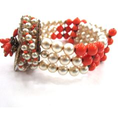 "Another very Haskell like bracelet that features faux pearl and faux coral beads strung on a wire cuff. There is a filigree plaque wired onto the bracelet that holds the center feature - faux coral beads and clear rhinestones on a gold leaf backing, surrounded by yet more beads! In very good condition. Bracelet is gently flexible to easily fit your wrist. Not for everyday wear but would make quite the statement for a fashion-forward bride. Top piece measures 1 1/2\" across." Hand-strung Coral Beaded Bracelets, Hand-strung Red Coral Jewelry Gift, Vintage Coral Round Bead Jewelry, Adjustable Hand-strung Coral Jewelry, Adjustable Hand-strung Coral Bracelets, Bride Top, European Cut Diamond Ring, Art Deco Pink, Wire Cuff