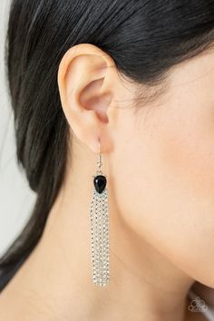 Dainty strands of glassy white rhinestones stream out from the bottom of a glittery black teardrop rhinestone, creating a timelessly tasseled display. Earring attaches to a standard fishhook fitting.

 Sold as one pair of earrings. Colorful Frames, Pink Peacock, Feather Fan, Black Gems, Paparazzi Accessories, White Rhinestone, Black Feathers, Black Earrings, Silver Bars