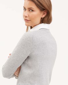 DESCRIPTIONThis round-neck women's sweater is crafted from plain knitted kid cashmere, an extremely fine and soft fibre, obtained exclusively from the undercoat of Hircus goat kids. The sweater features a micro-ribbed neckline trim. Its precious and exclusive yarn makes this garment the luxury version of an essential knitwear item.FABRICSThe "kid cashmere" yarn is obtained from the undercoat of Hircus goats kids. The natural molt allows to harvest this precious, exclusive and ultralight fibre wi Goat Kidding, Cashmere Yarn, Round Neck Sweaters, Ribbed Neckline, Women's Wardrobe, Women's Sweater, Light Grey, Round Neck, Knitwear