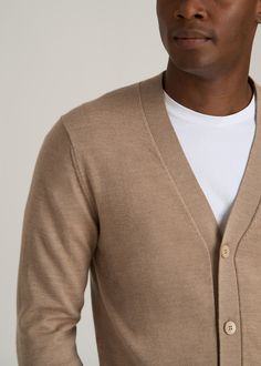 Get Wrapped Up in Warmth So Soft, So Stylish Experience the luxury of our Merino Wool Cardigan Sweater for Tall Men. This stylish tall men's sweater is perfect for layering over dress shirts or tees, offering both warmth and sophistication. Its ribbed cuffs and hem ensure a snug fit, while the modern fit keeps you looking sharp.• Tall men's merino wool sweater for superior warmth and softness• Ribbed cuffs and hem for a secure, stylish fit• Long sleeves and modern fit perfect for tall men SIZE & Scrubs Dress, Cool Looks, Cozy Sleepwear, Over Dress, Tall Men, Merino Wool Cardigan, Sports Blazer, Long Sleeve Tee Shirts, Merino Wool Sweater