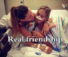 two girls in a hospital bed with the caption real friendship